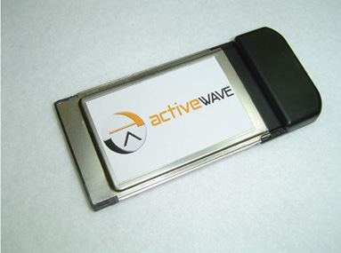 The PC-Card Reader: a laptop expansion card with the ActiveWave logo on its face and a black cap at one end.