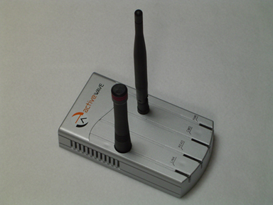 The Smart Field Generator: a silver ActiveWave case with two black antennas.